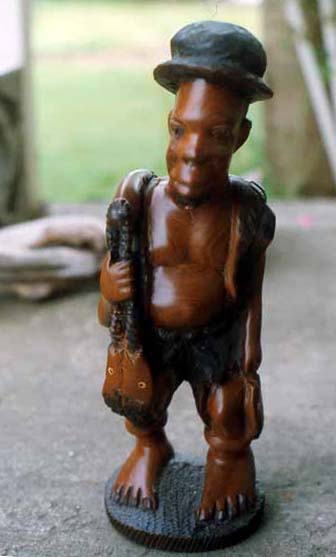 Photo of carving of fisherman Photo of carving of fisherman