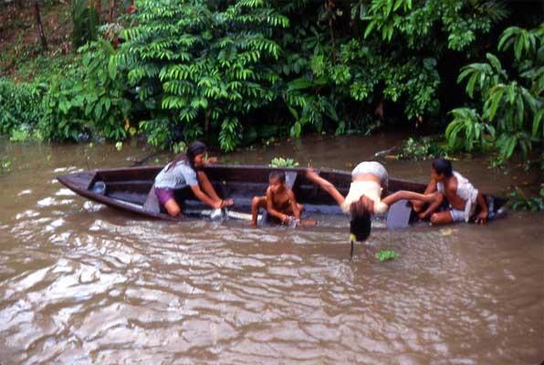 playing in canoe photo