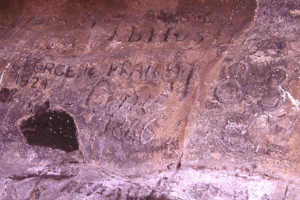 Photo of names carved in rock